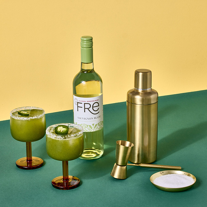 Color image of a bottle of FRE Alcohol-Removed wine with 2 green cocktails
