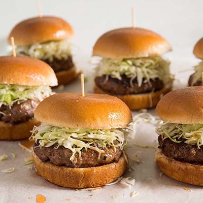 Turkey sliders with lettuce on a marble surface